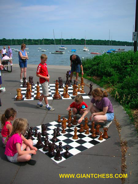 family_with_outdoor_chess.jpg