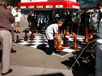 children_play_outdoor_chess