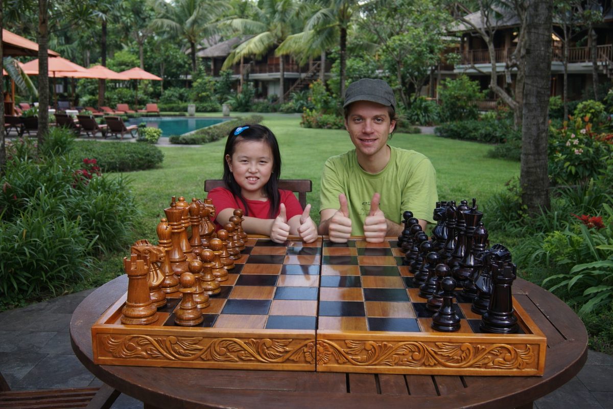 Thumbnail for Teakwood Chess Experience at a Tropical Resort Garden