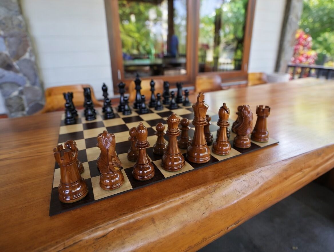 Thumbnail for Timeless Strategy in Teakwood: Chess by the Window